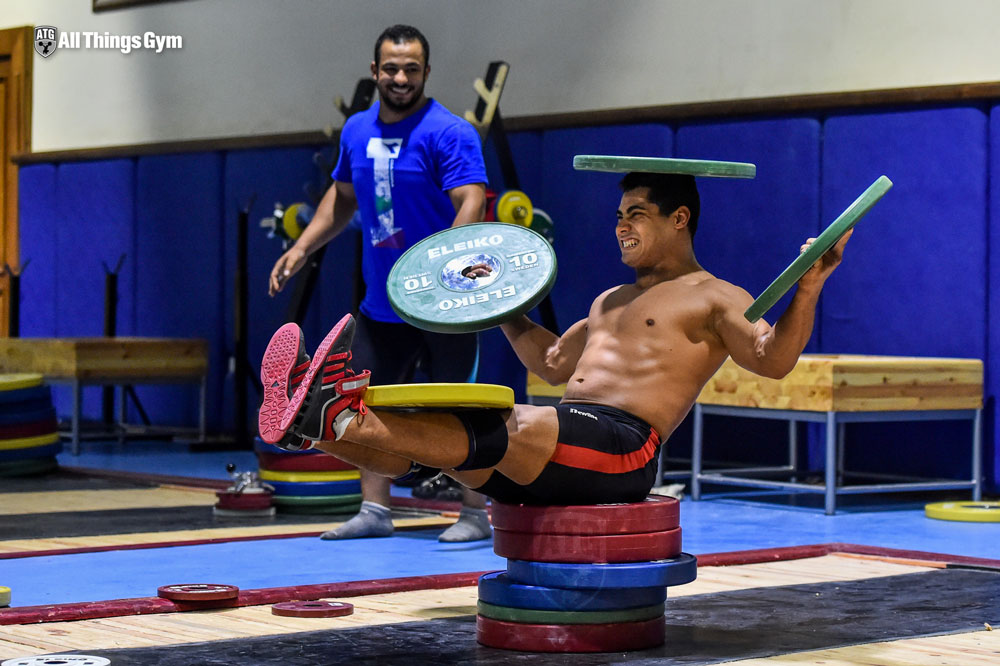 Mohamed Ehab Plate Balancing on Head Abs Core Workout